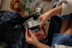 best makeup subscription boxes - hands unboxing beauty products from a subscription box